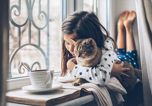 Child with pet