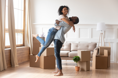 Happy couple in new home